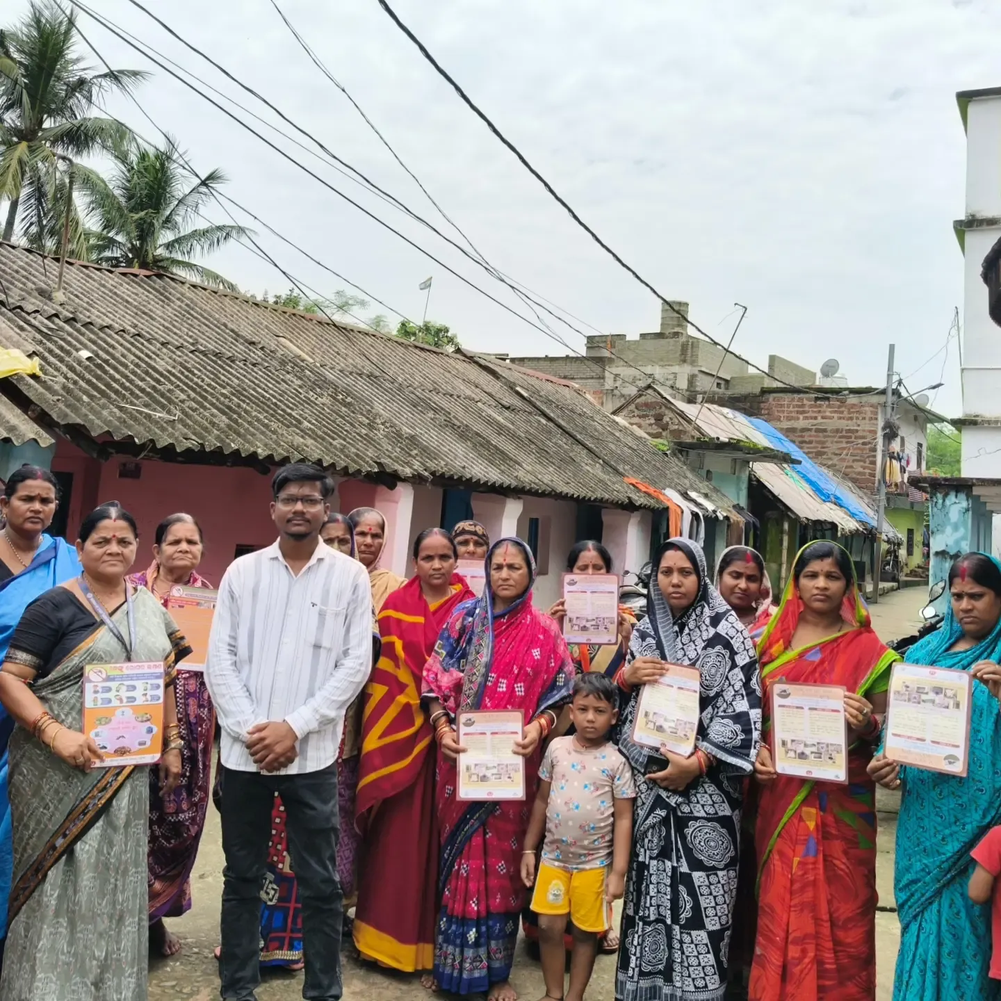 JYS volunteer with women from the ward during a dengue awareness drive